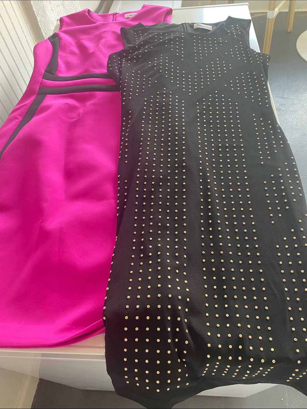 2 Calvin Klein knit dresses. Size 4. 1 Fuchsia and 1 Black. Great condition.